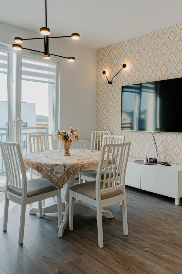 U Siebie W Domu. W Nowej Dzielnicy. Apartment *