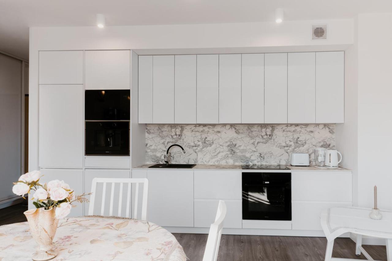 U Siebie W Domu. W Nowej Dzielnicy. Apartment *